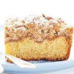 New Jersey Crumb Coffee Cake piled high with crumb topping and topped with powdered sugar