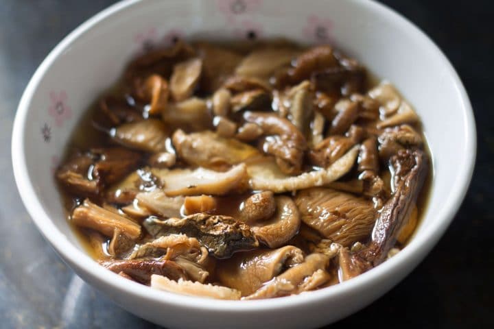 Dried mushrooms soaking in hot water