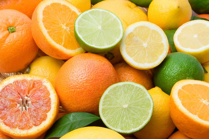 various citrus fruit sliced and unsliced