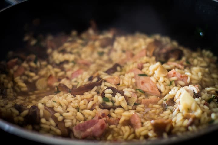 the Easy Mushroom & Bacon Risotto cooked in the pan