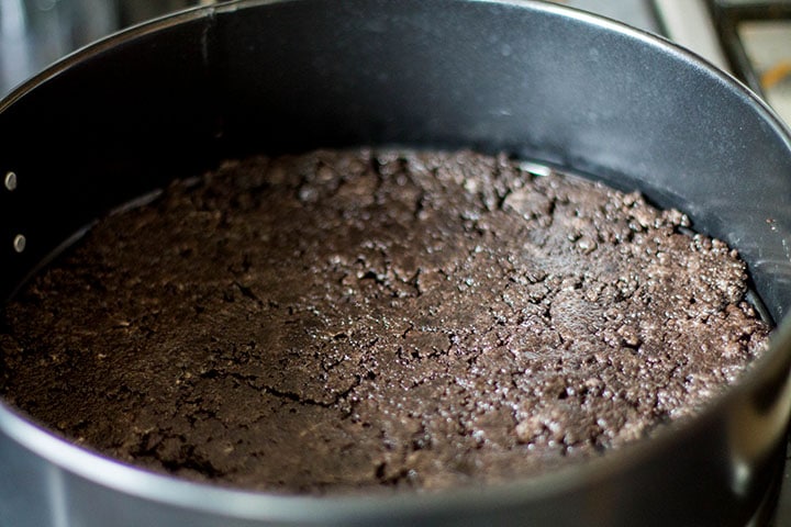 The cookie mixture pressed into the pan