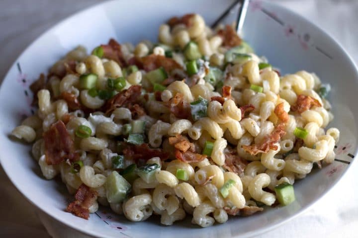 Bacon & Green Onion Pasta Salad in a bowl with two spoons