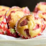 A close up of Strawberry Honey Cornbread Muffin