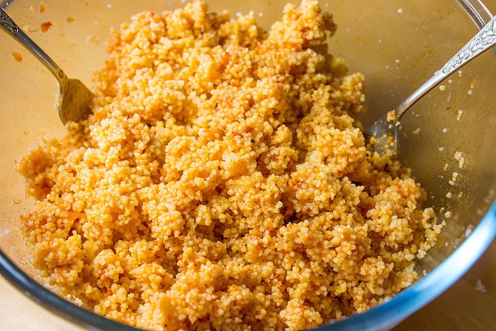 The couscous coated in the dressing.