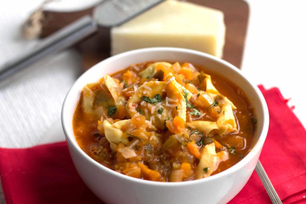 Tortellini Vegetable Soup  in a bowl ready to serve- Erren's Kitchen - This recipe is filling meal that's packed with flavor and healthy ingredients!
