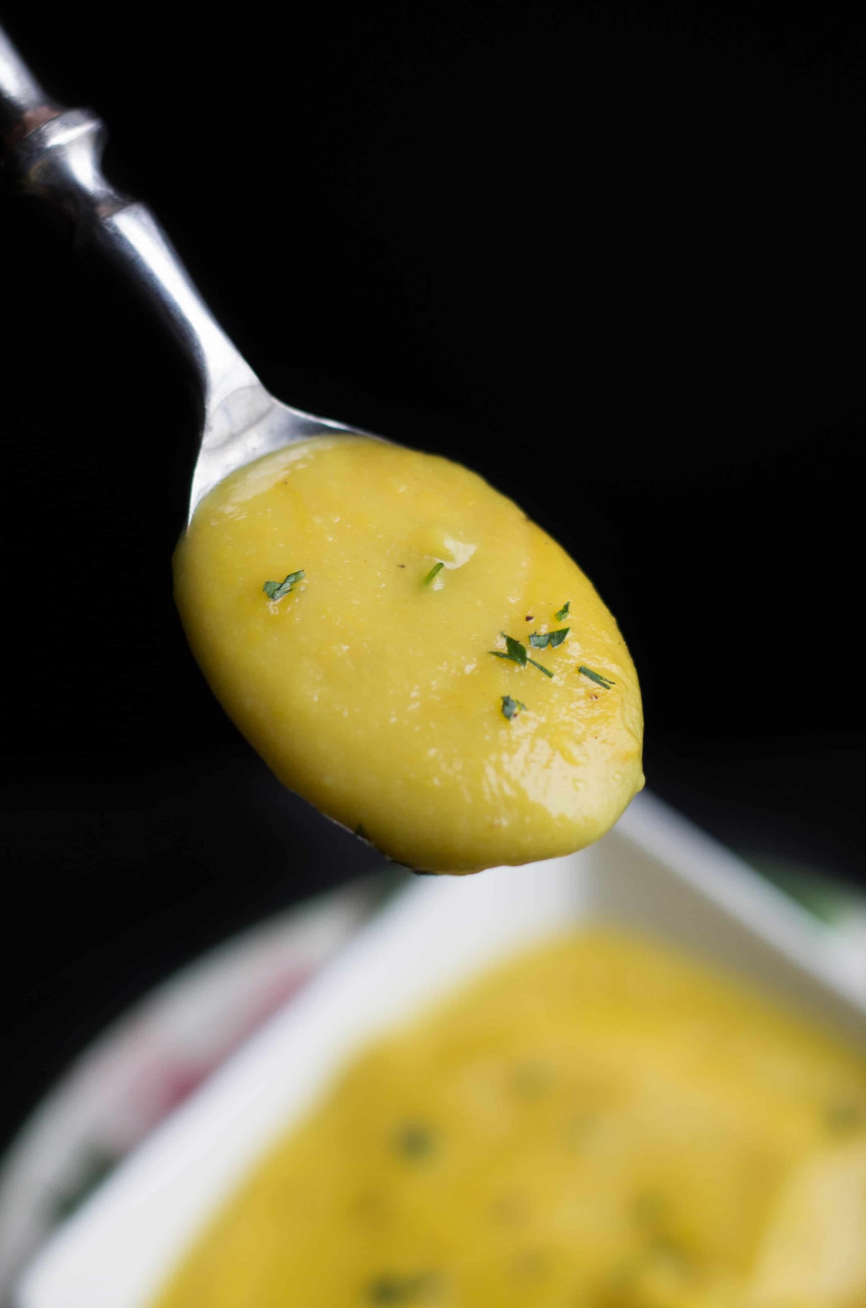 A spoonful of Low Fat Creamy Cauliflower Saffron Soup 