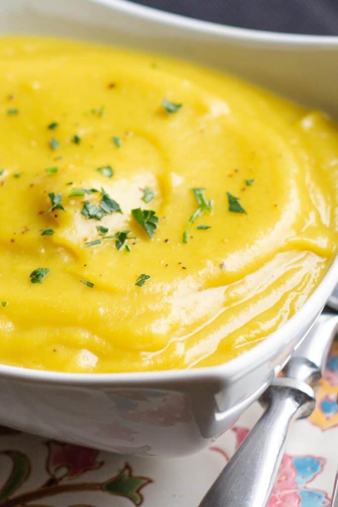 a bowl full of yellow Cauliflower Saffron Soup