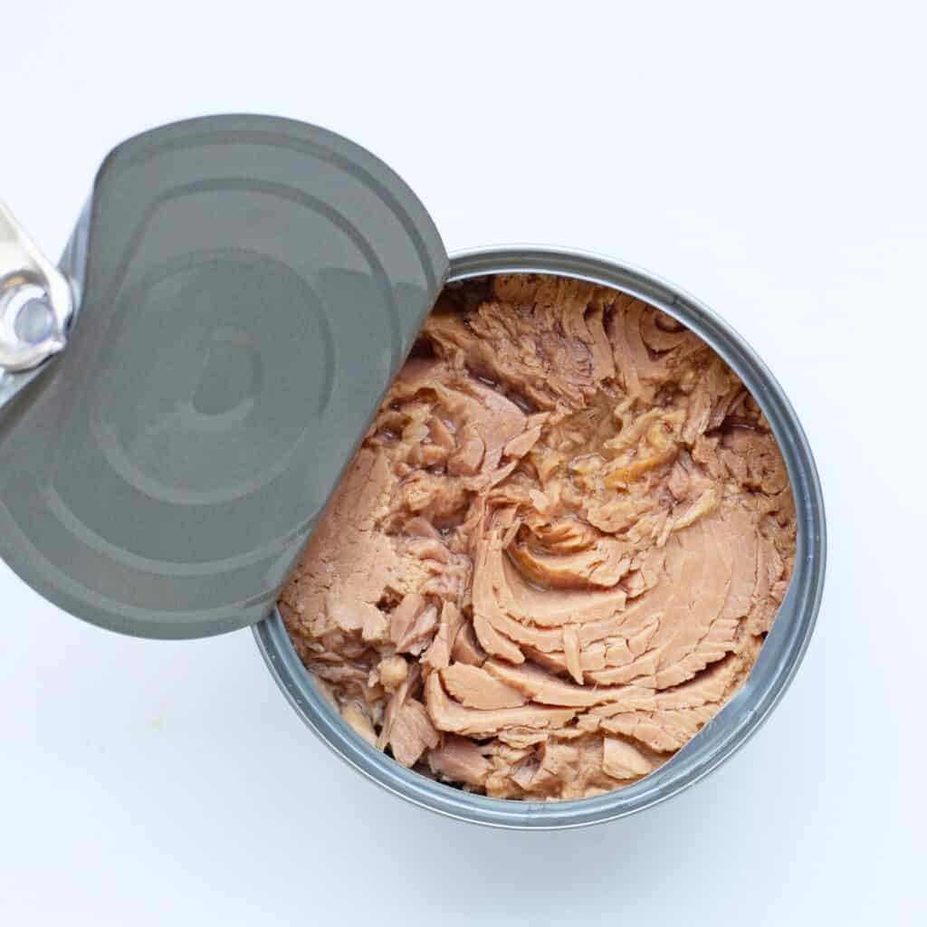 a close up image of a can of tuna