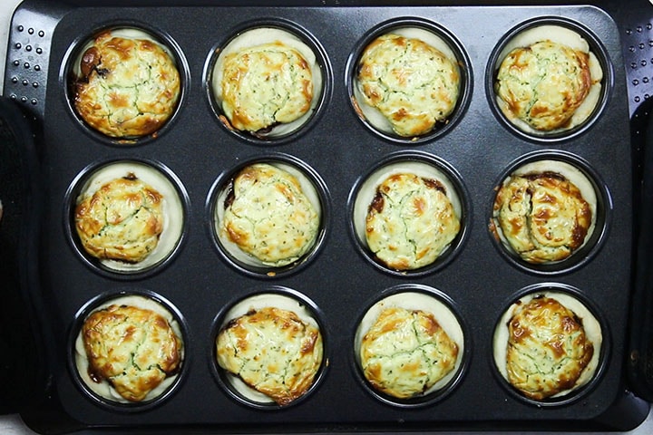 The baked Feta and Caramelized Onion Tarts still in the pan