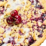 an overhead shot of cherry vanilla shortbread tart