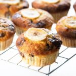 chocolate chip banana muffins cooling on a cooling rack