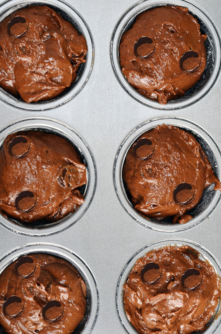 A muffin pan with the batter added ready to bake