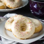 Easy Baked Iced Vanilla Doughnuts - Erren's Kitchen - This recipe makes a much healthier version of a popular treat. They may be baked instead of fried, but taste just as good and they’re soft, full of vanilla flavor, and generously topped in a creamy vanilla icing.