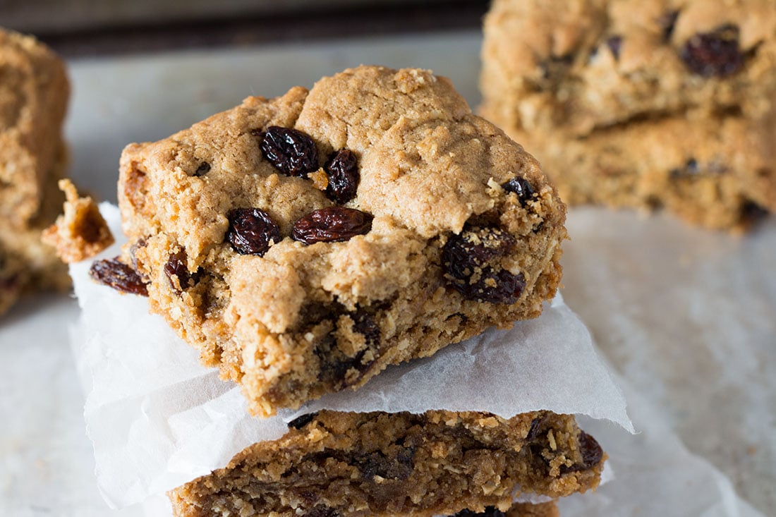 Cinnamon Raisin Oat Bars - Erren's Kitchen - This delightful recipe make an oatmeal cookie bar that's crisp on the outside with a buttery soft center. Best served warm, they are an amazing treat for dessert or even just a snack.