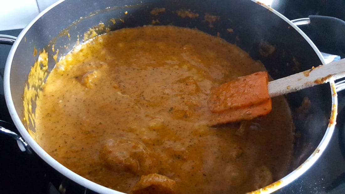 Thai Red Curry heating in the pan.