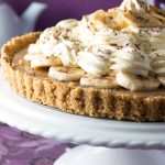 This recipe for No Bake Banoffee Pie from Erren's Kitchen makes a dazzling dessert layered with a graham cracker base, creamy caramel sliced bananas, and a whipped cream topping.