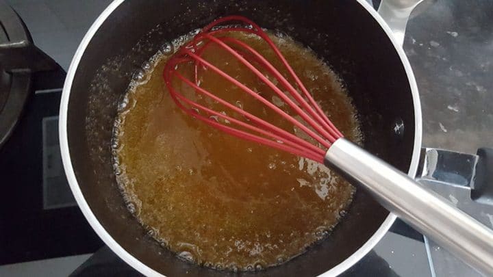 Sugar and butter cooking together in a pot