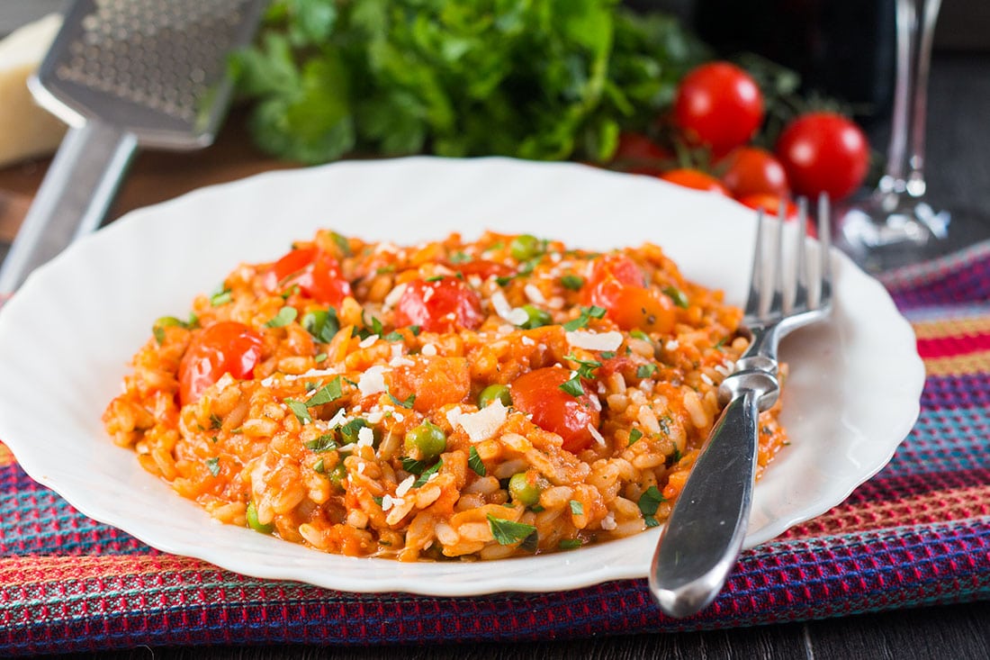 Use up your summer tomatoes with this recipe for Roast Tomato and Pea Risotto from Erren's Kitchen. This Italian classic is finished off with a splash of balsamic vinegar and grated Parmesan.