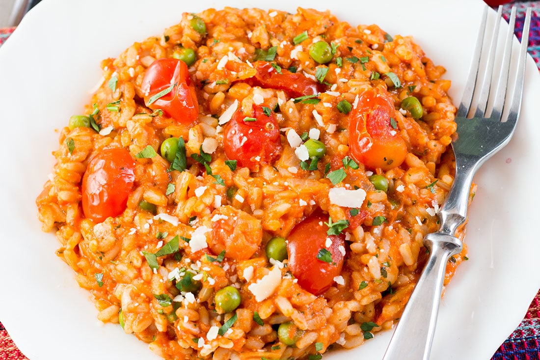 Use up your summer tomatoes with this recipe for Roast Tomato and Pea Risotto from Erren's Kitchen. This Italian classic is finished off with a splash of balsamic vinegar and grated Parmesan.