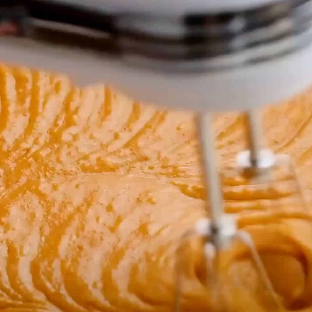 Pumkin coffee cake batter being mixed in a bowl