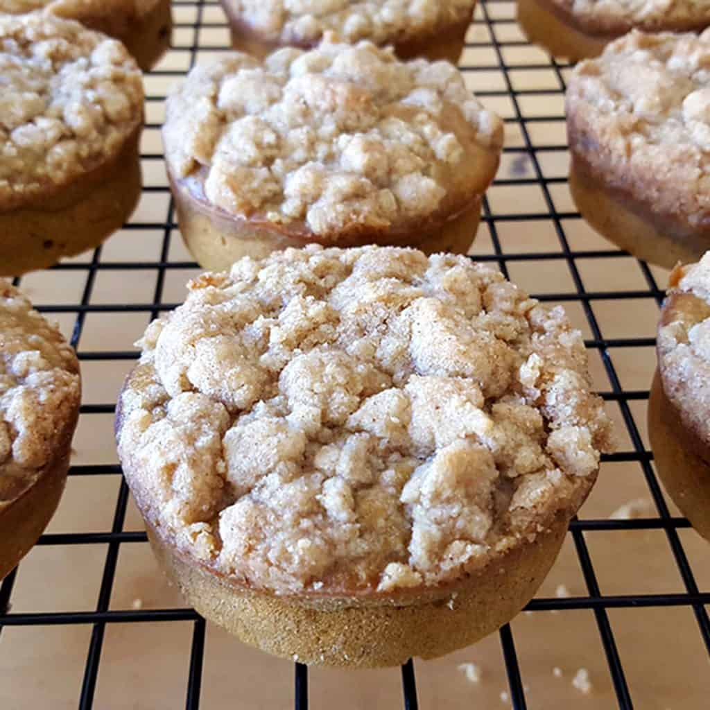 the fresh baked pumpkin coffee cakes cooling on a cooling rack