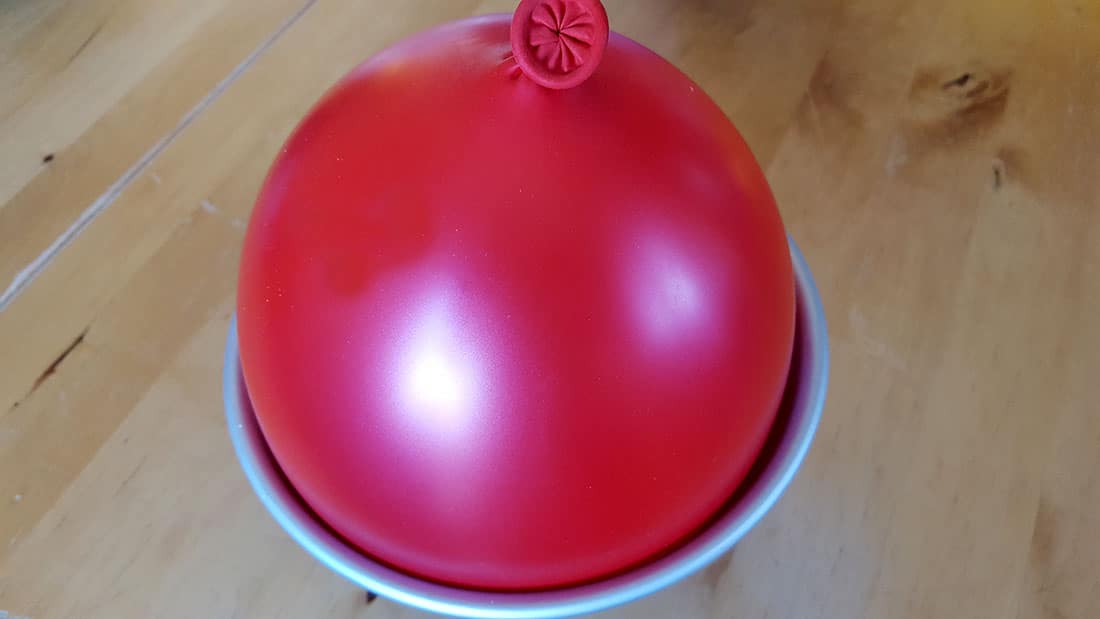 Chocolate Christmas Smash Cake prep two- balloon in a bowl