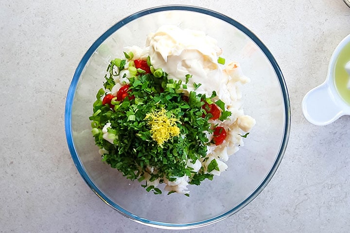 The mayonnaise, parsley and lemon zest added to the crab mixture 