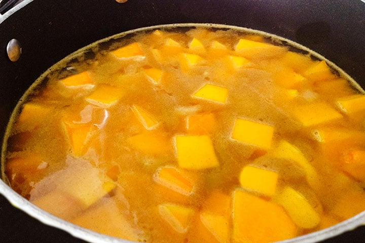 The squash and stock added to the pot