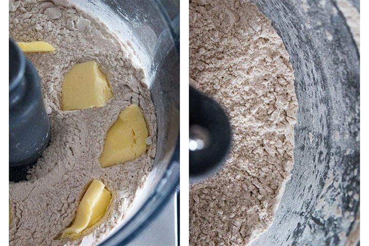 a close up of a food processor bowl with cubed butter laying in the dry ingredients and another with it mixed into small clumps