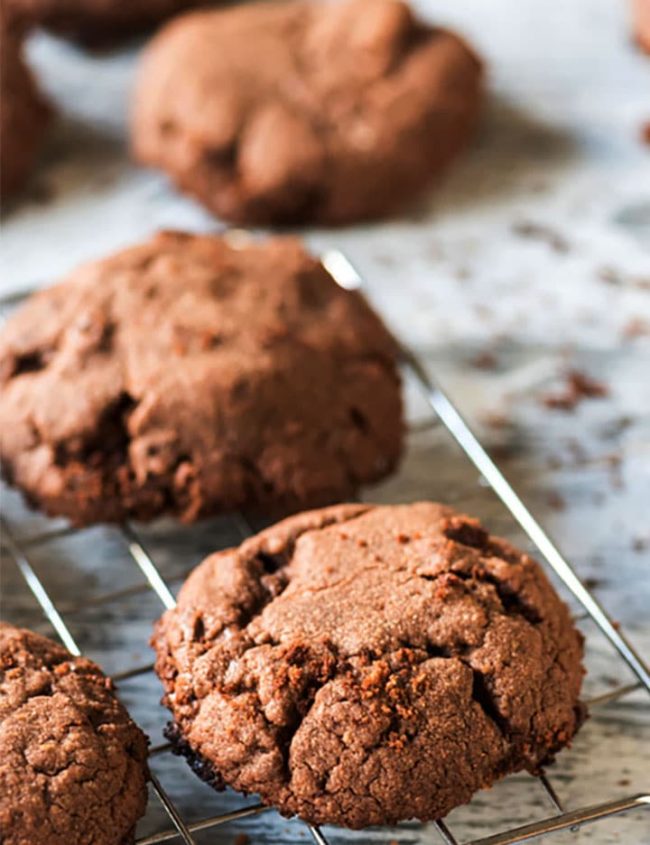 A close up of a Chocolate hazelnut cookies cooling on a cooling rack