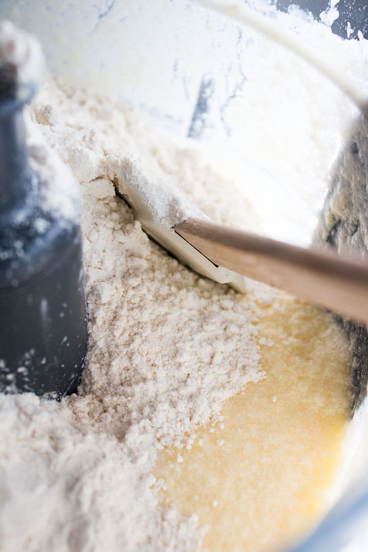 The flour being mixed into the cake batter