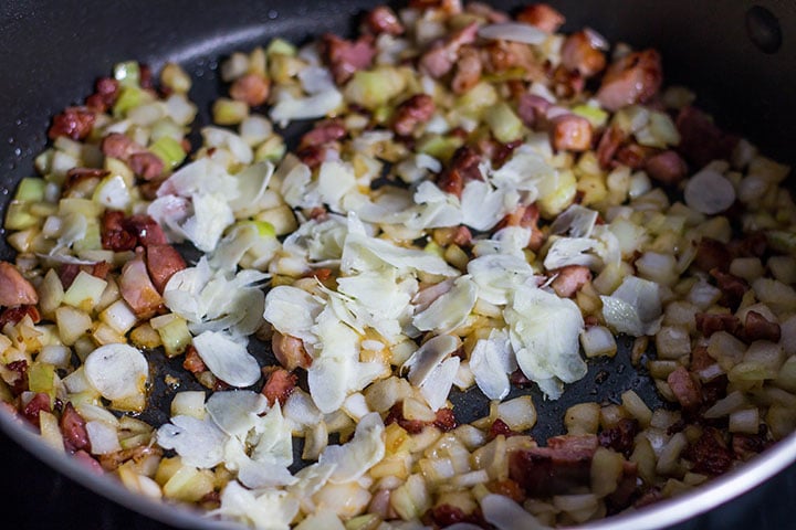 The garlic added to the pan with the bacon and omions