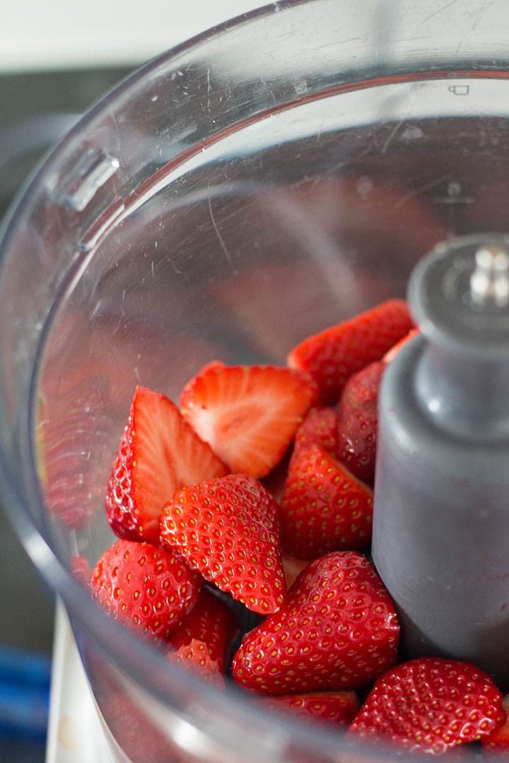 Strawberries in a food processor bowl