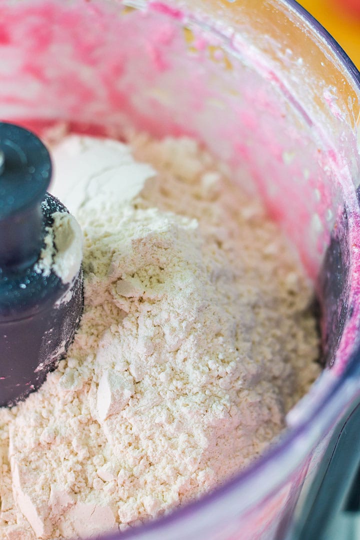 The dry ingredients added to the bowl with the wet