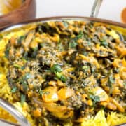 Sag Bahji {Spinach Curry} served over rice in bowl