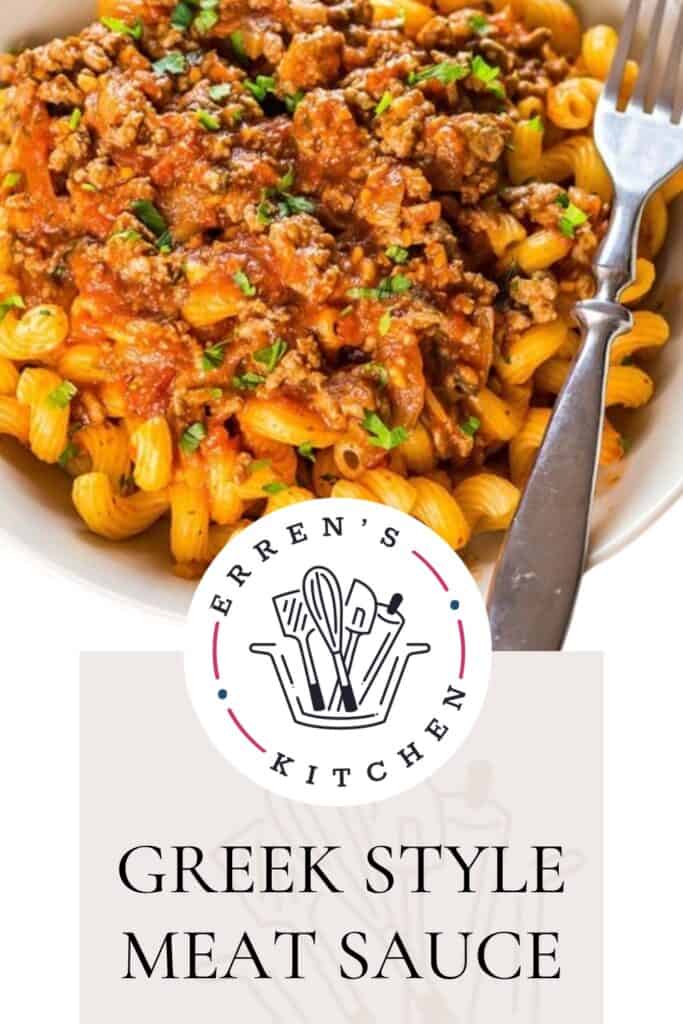 A close-up of a plate of cavatappi pasta mixed with a rich, Greek-style meat sauce and sprinkled with fresh herbs, next to a fork. The Erren's Kitchen logo is at the top with the text "GREEK STYLE MEAT SAUCE" written boldly below.