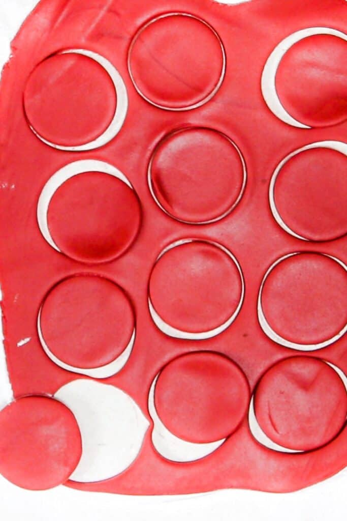 red fondant that's tolled with circles cut out