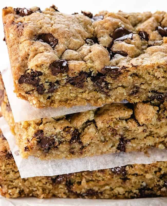 Three Chocolate Chip Oatmeal Cookie Bars stacked on top of each other.