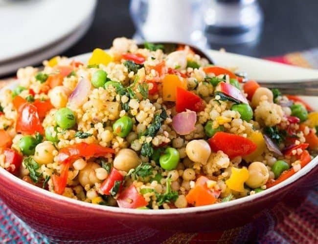 a heaping bowl of Moroccan Spiced Vegetable Couscous