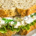 a close up of A tuna salad sandwich with lettuce