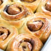 A pan of Cinnamon Rolls with a glaze on top