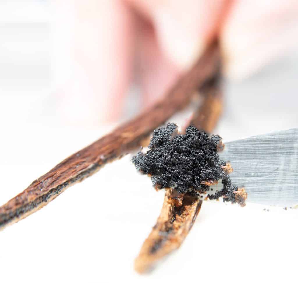 a vanilla pod being scraped for the vanila beans