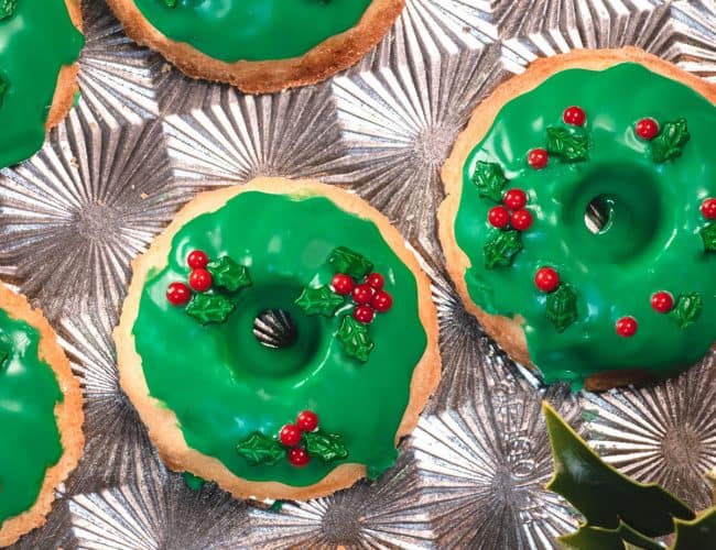 Christmas Wreath Cookies displayed on a silver tray.