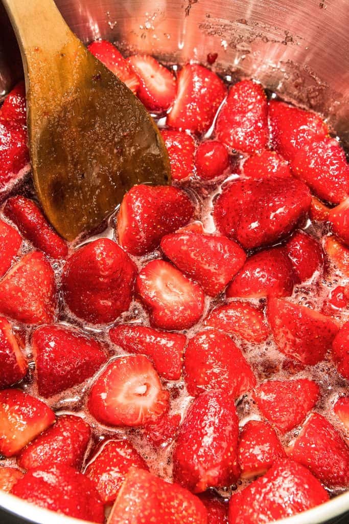 strawberries in a pot being stirred