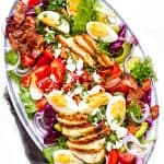 overhead shot of a cobb salad on a platter