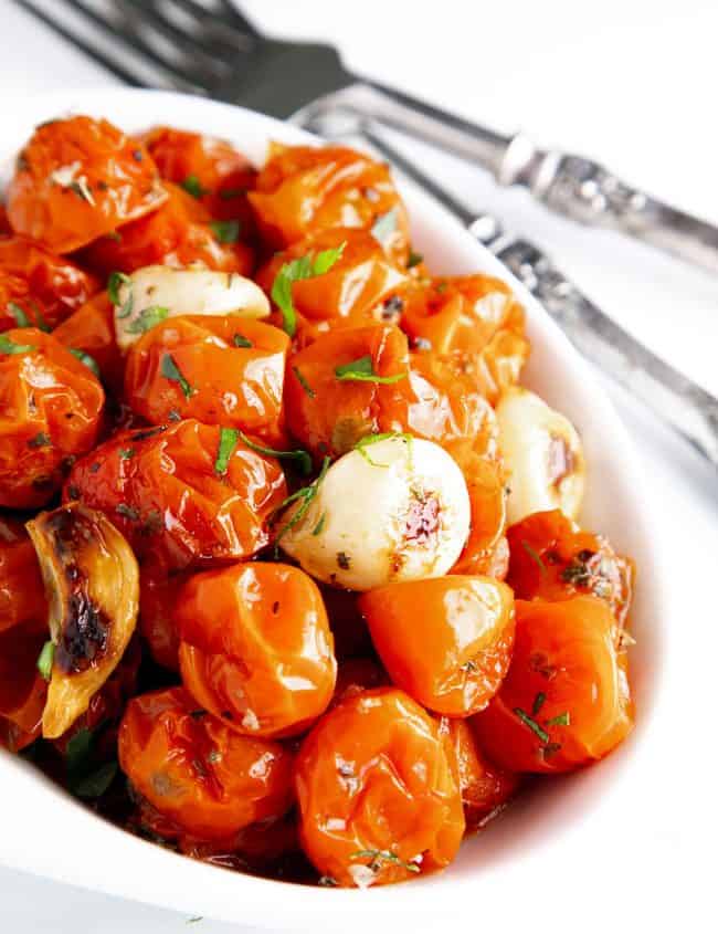 a bowl of roasted cherry tomatoes ready to serve