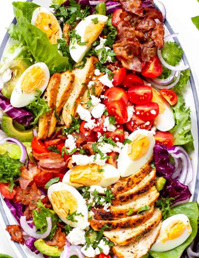 overhead, close up shot of a cobb salad on a platter