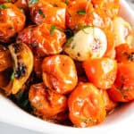 A bowl of roasted cherry tomatoes ready to serve