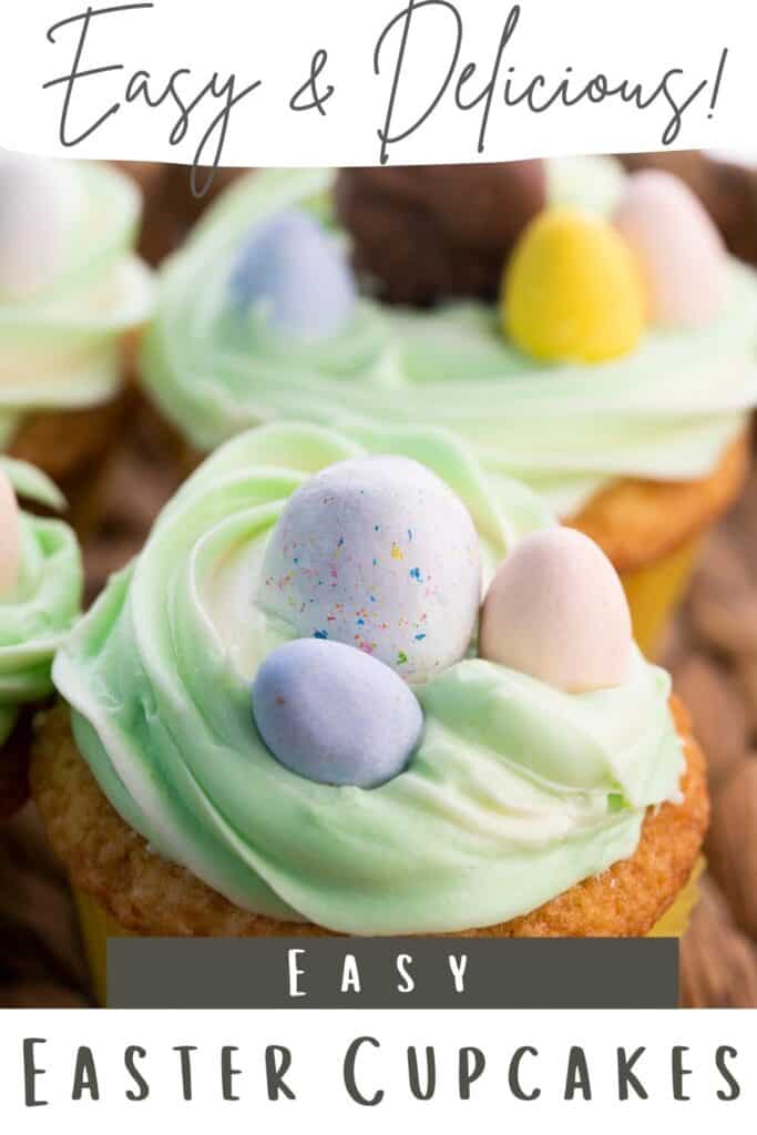 a cupcake with green frosting and three mini easter eggs