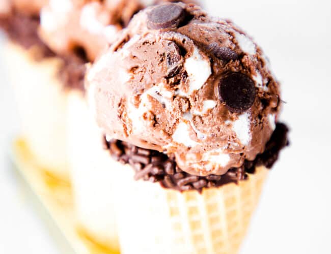 three ice cream cones with scoops of Chocolate Marshmallow Ice Cream